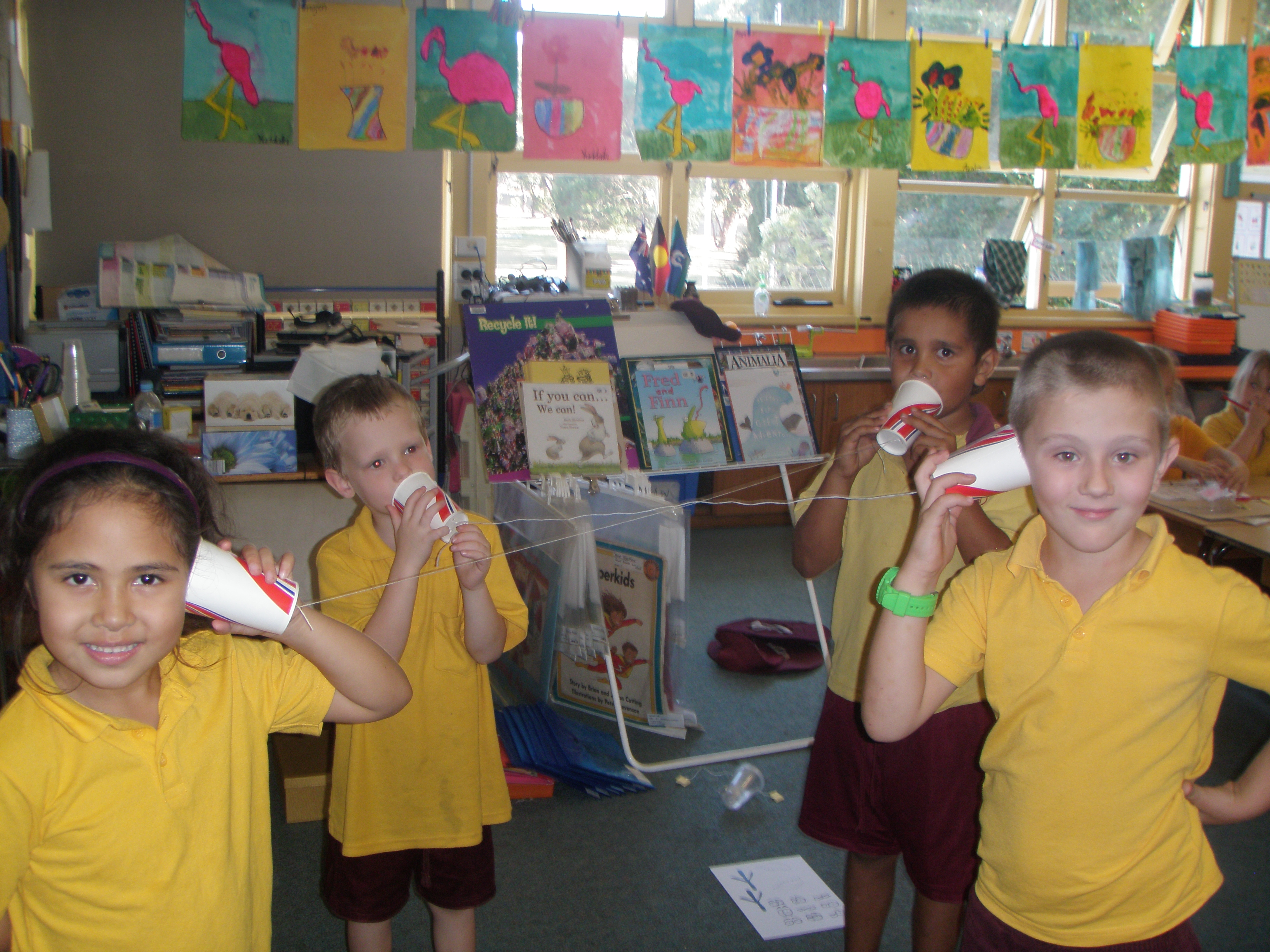Experimenting with paper cup telephones