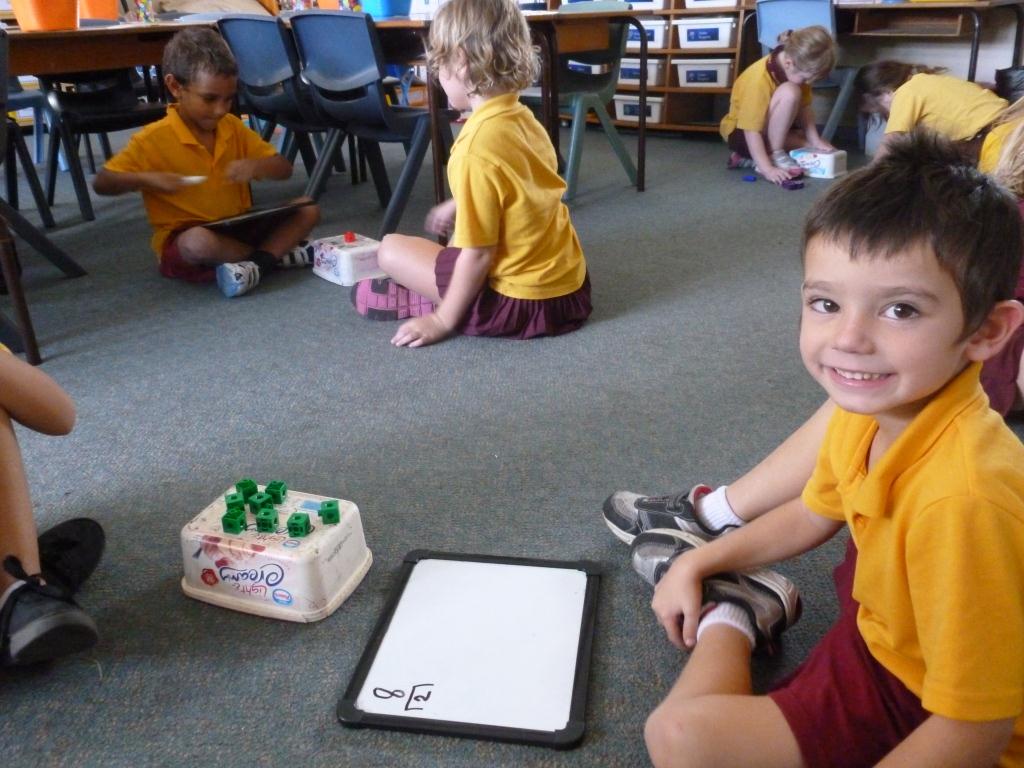 Riley learning friends of ten by playing blocks on a bowl